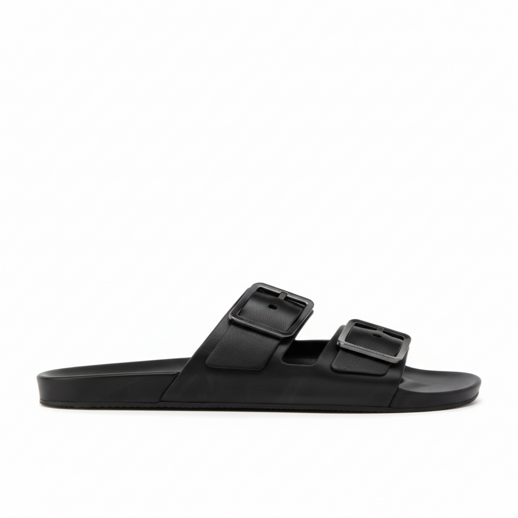 Black sandal with two buckles on a white background